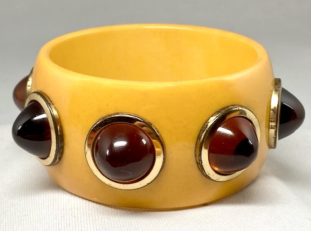 BB338 goldenrod bakelite bangle with rootbeer bullet dots